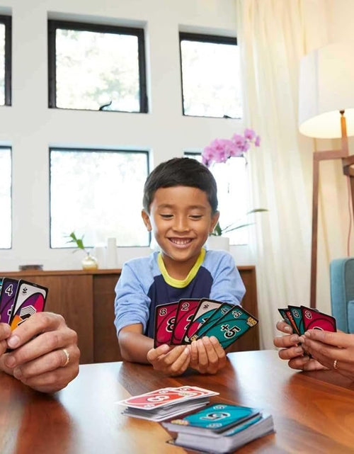 Load image into Gallery viewer, UNO FLIP! Card Game in Storage &amp; Travel Tin, Color Blind Accessible Deck for Kids, Adults &amp; Family Nights &amp; Parties (Amazon Exclusive) - My Store

